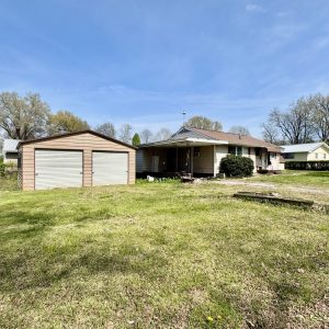 This image is by Powell Auction & Realty.