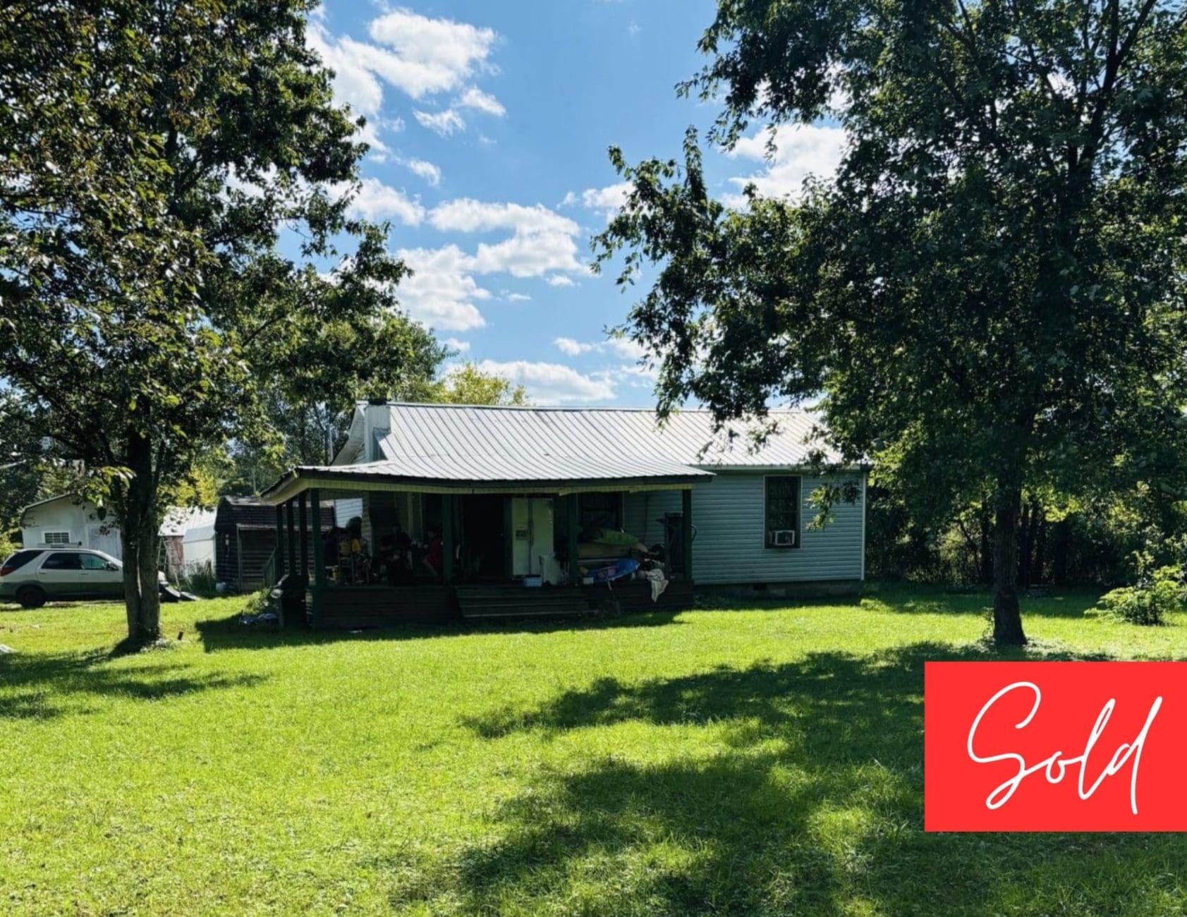 This image is by Powell Auction & Realty.