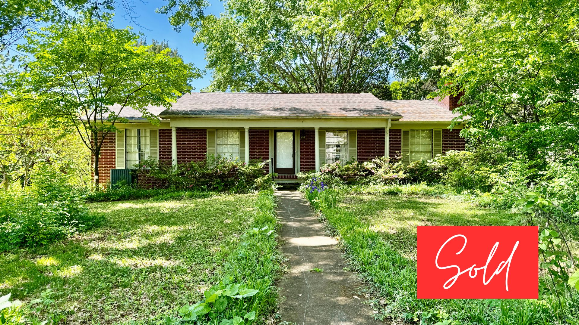 This image is by Powell Auction & Realty.