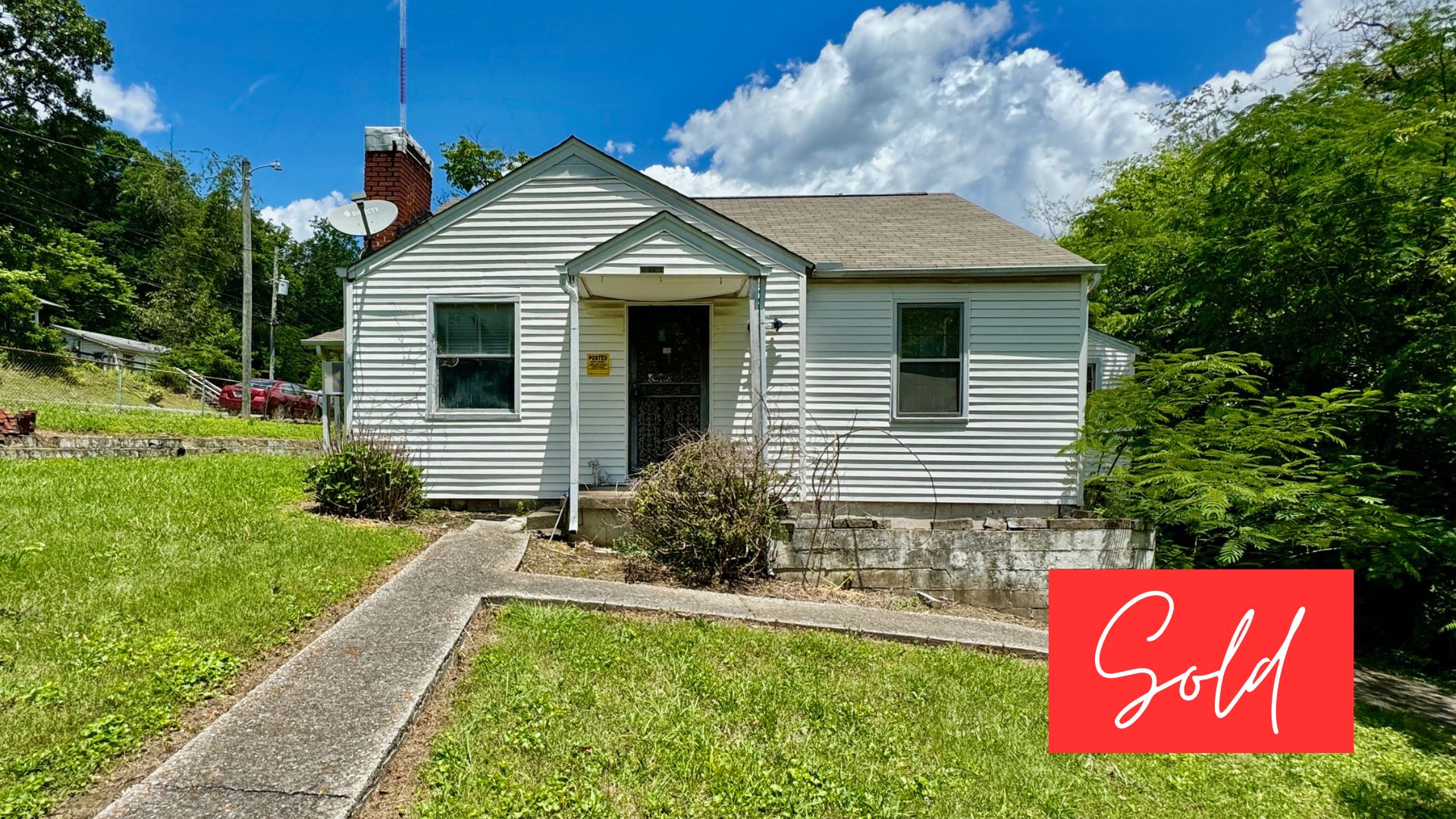 This image is by Powell Auction & Realty.
