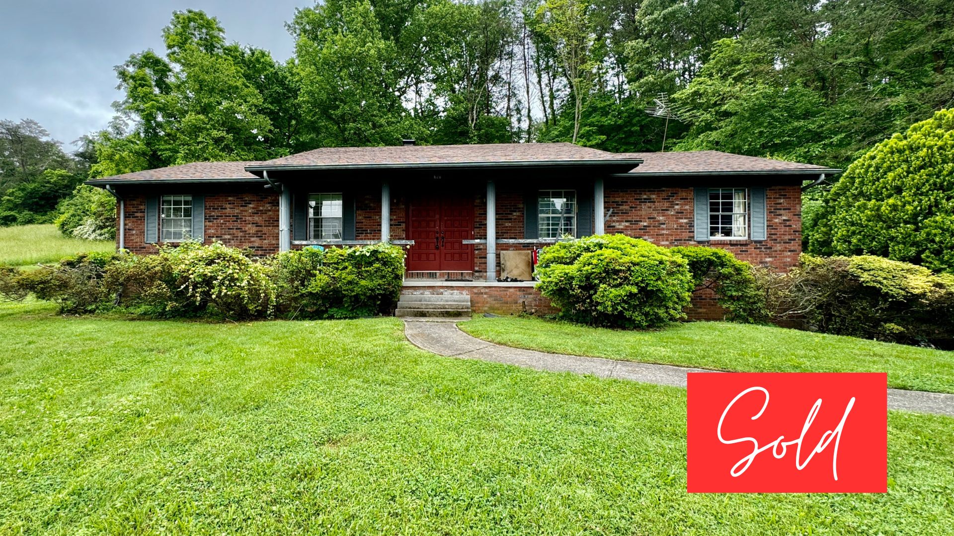 This image is by Powell Auction & Realty.