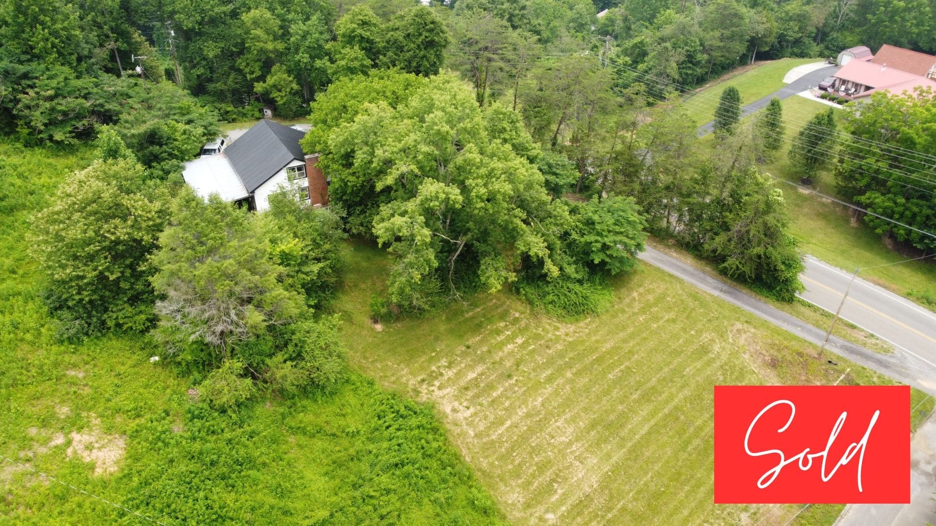 This image is by Powell Auction & Realty.