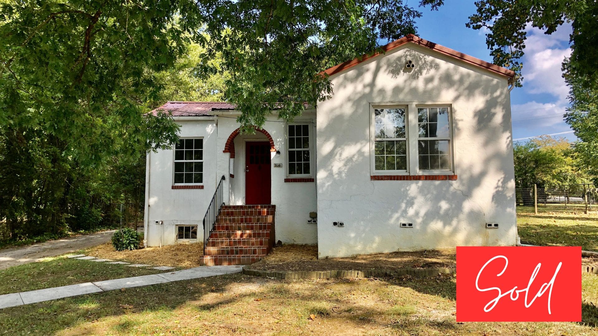 This image is by Powell Auction & Realty.