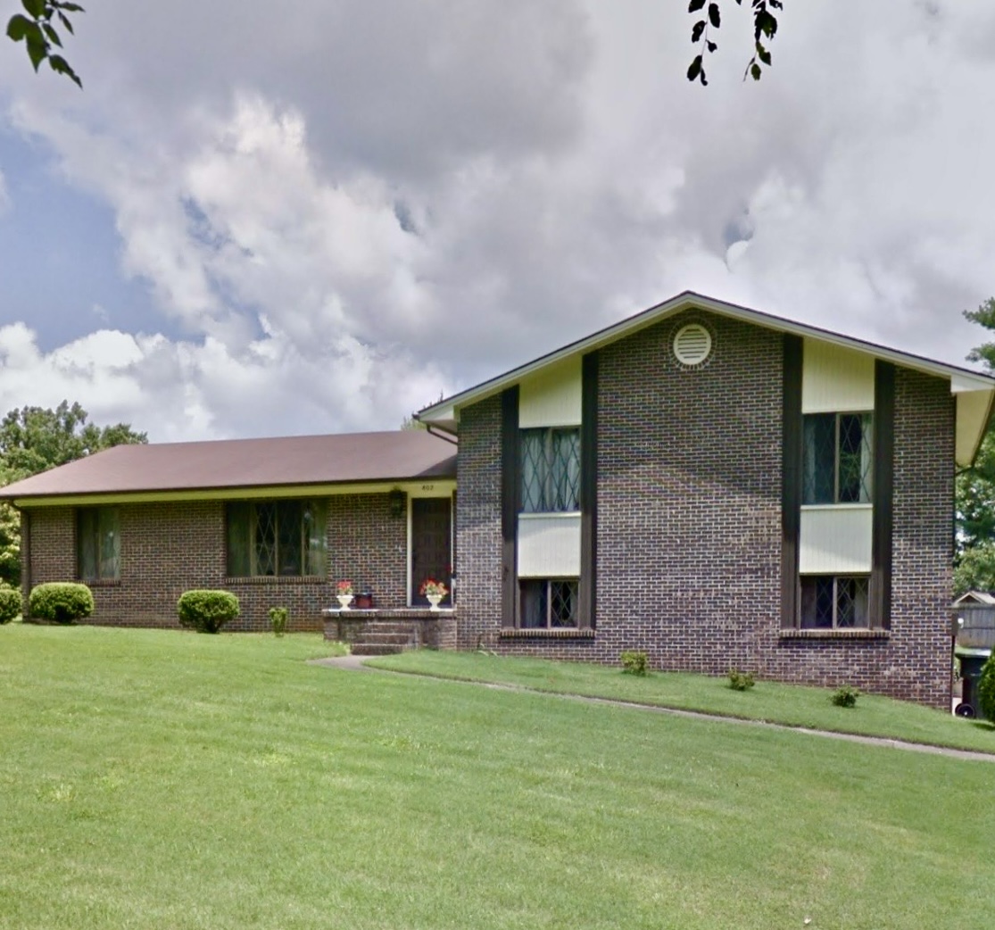 This image is by Powell Auction & Realty.